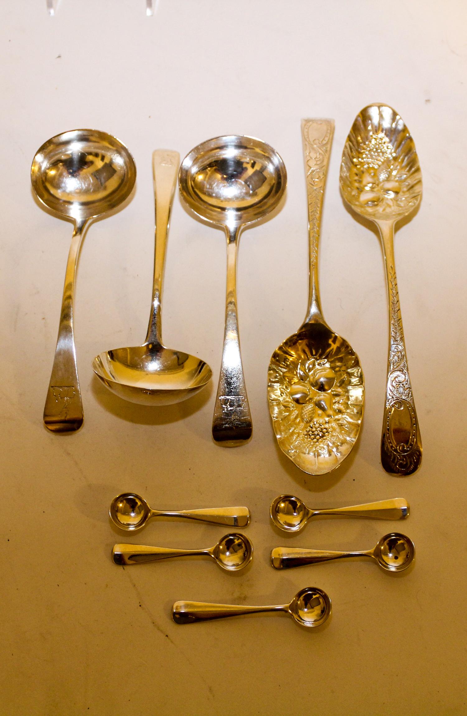 A Collection of English Silver Spoons Length of longest 8 7/8 inches.