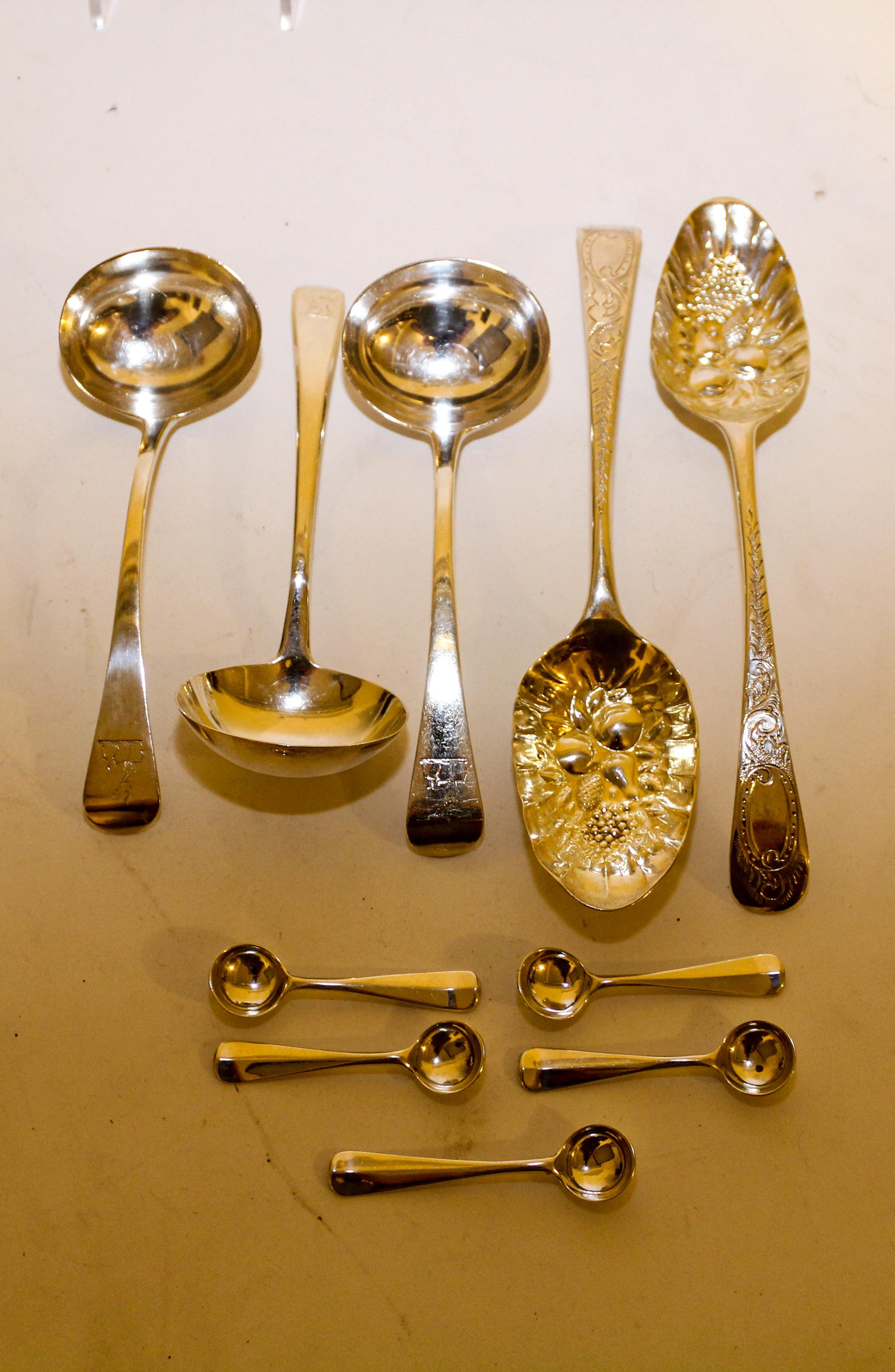 A Collection of English Silver Spoons Length of longest 8 7/8 inches.