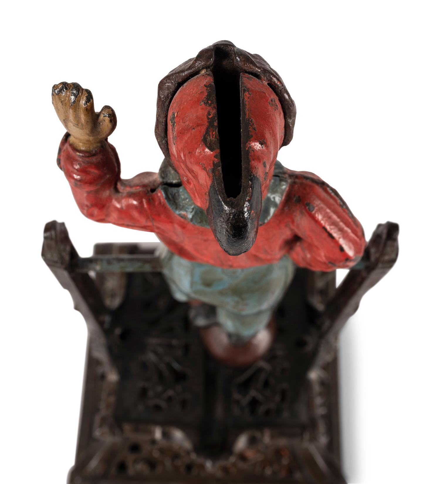 A Trapeze Boy Cast Iron Mechanical Bank