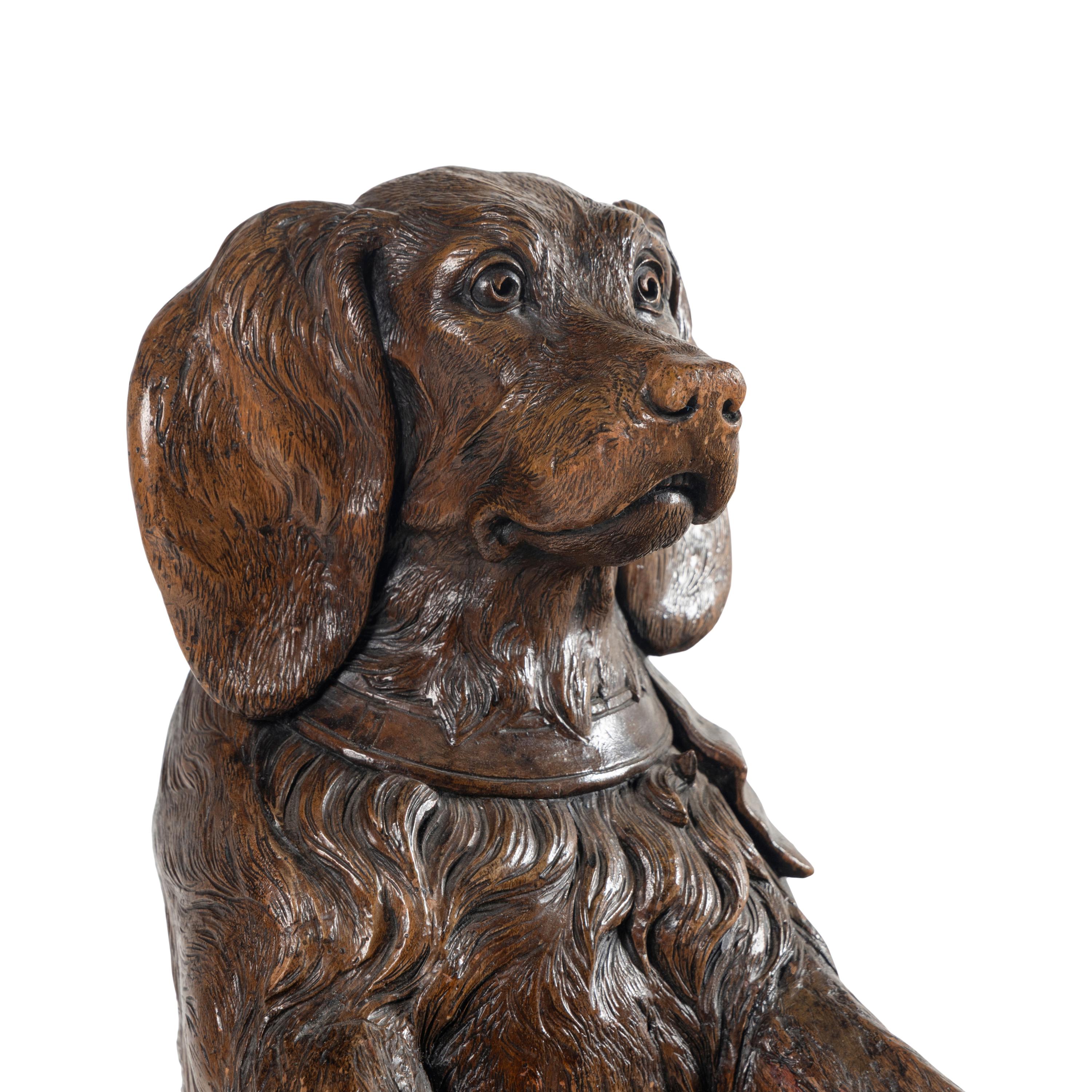 A Swiss "Black Forest" Carved Figural Umbrella Stand