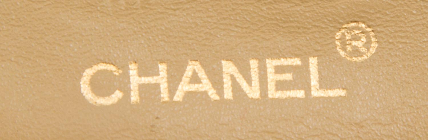 A Chanel Tan Quilted Leather Double Flap Bag, 9.5"x 5.5" x 2.5".