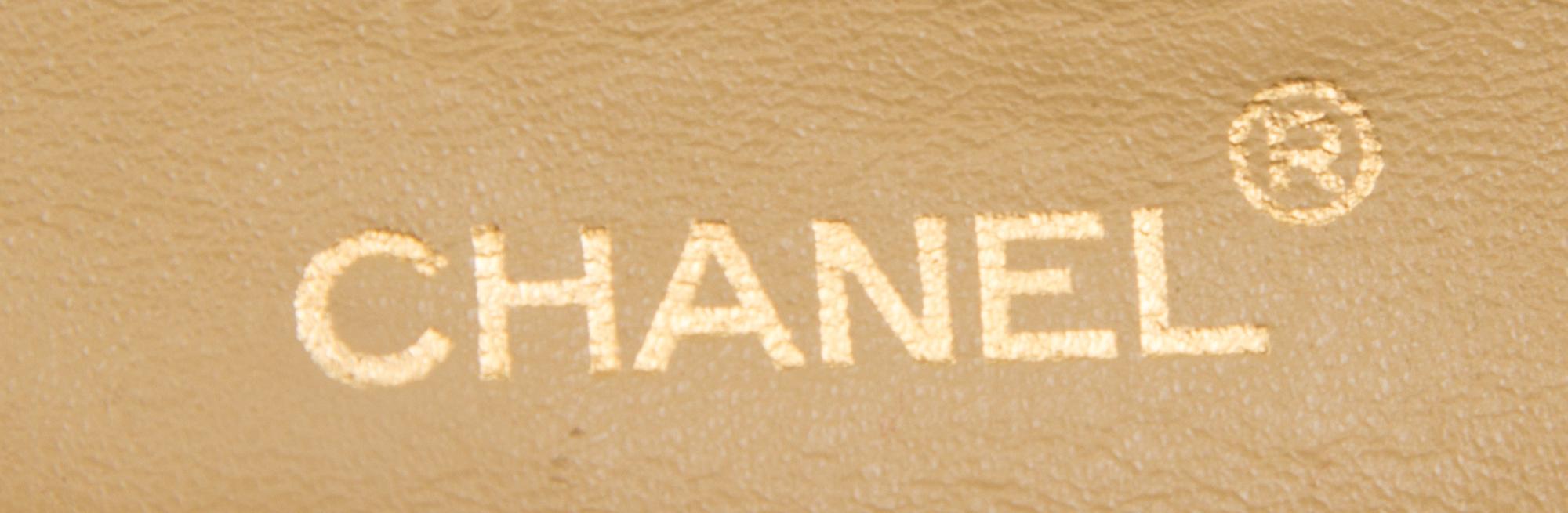 A Chanel Tan Quilted Leather Double Flap Bag, 9.5"x 5.5" x 2.5".