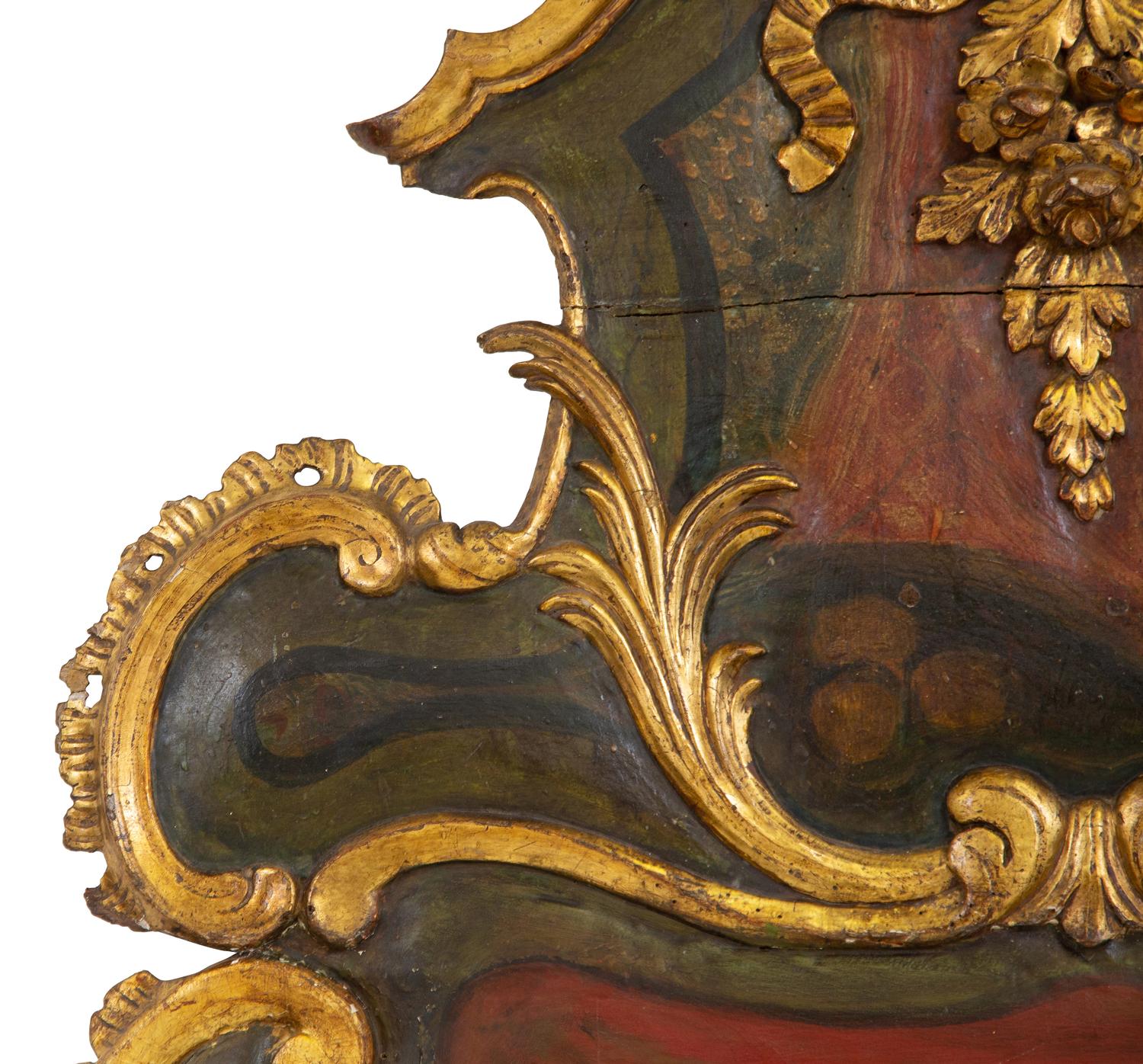 An Italian Painted and Parcel Gilt Mirror