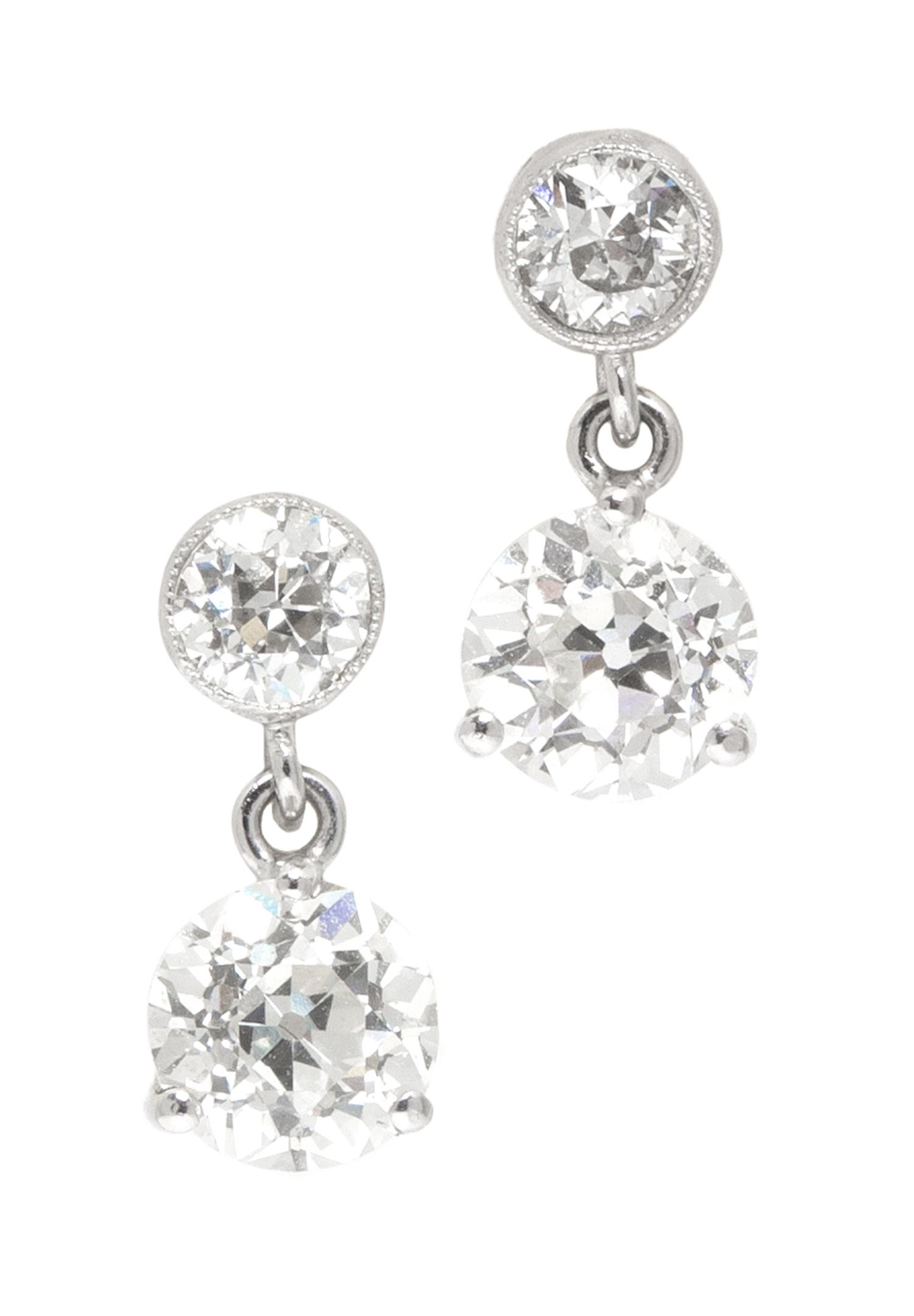 A Pair of White Gold and Diamond Drop Earrings, 1.30 dwts.