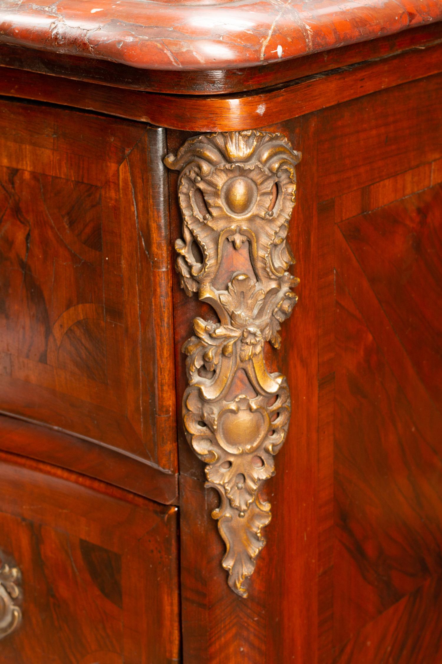 A Régence Gilt Bronze Mounted Parquetry Marble-Top Commode