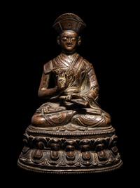 A Tibetan Bronze Figure of a Lama