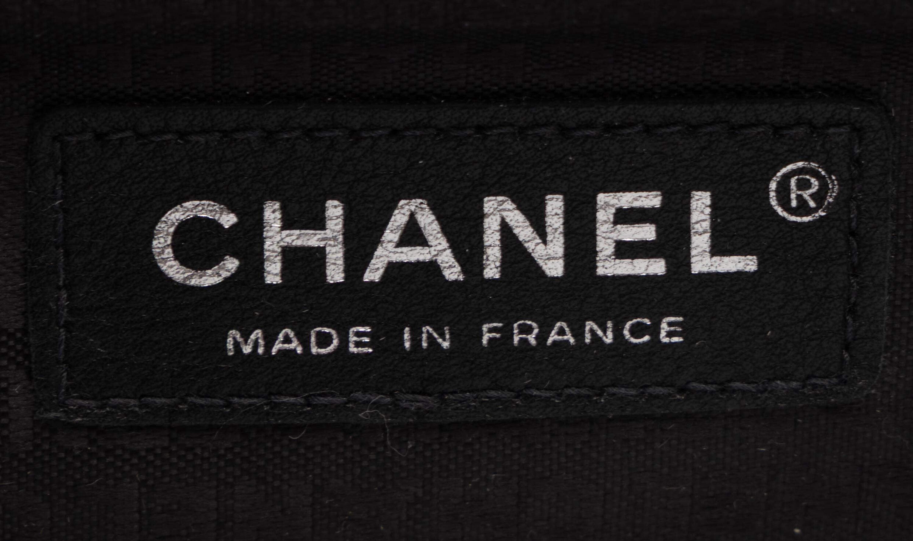 Chanel, Quilted White & Black Leather Clutch