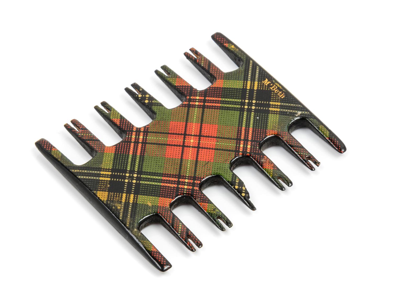 A Tartanware Comb Thread Winder Width 2 inches.