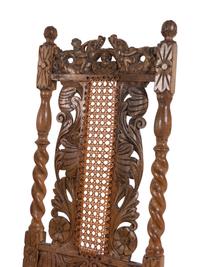 An Assembled Set of Eight English Baroque Walnut Cane-Upholstered Dining Chairs
