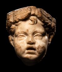 A Roman Marble Head of Eros