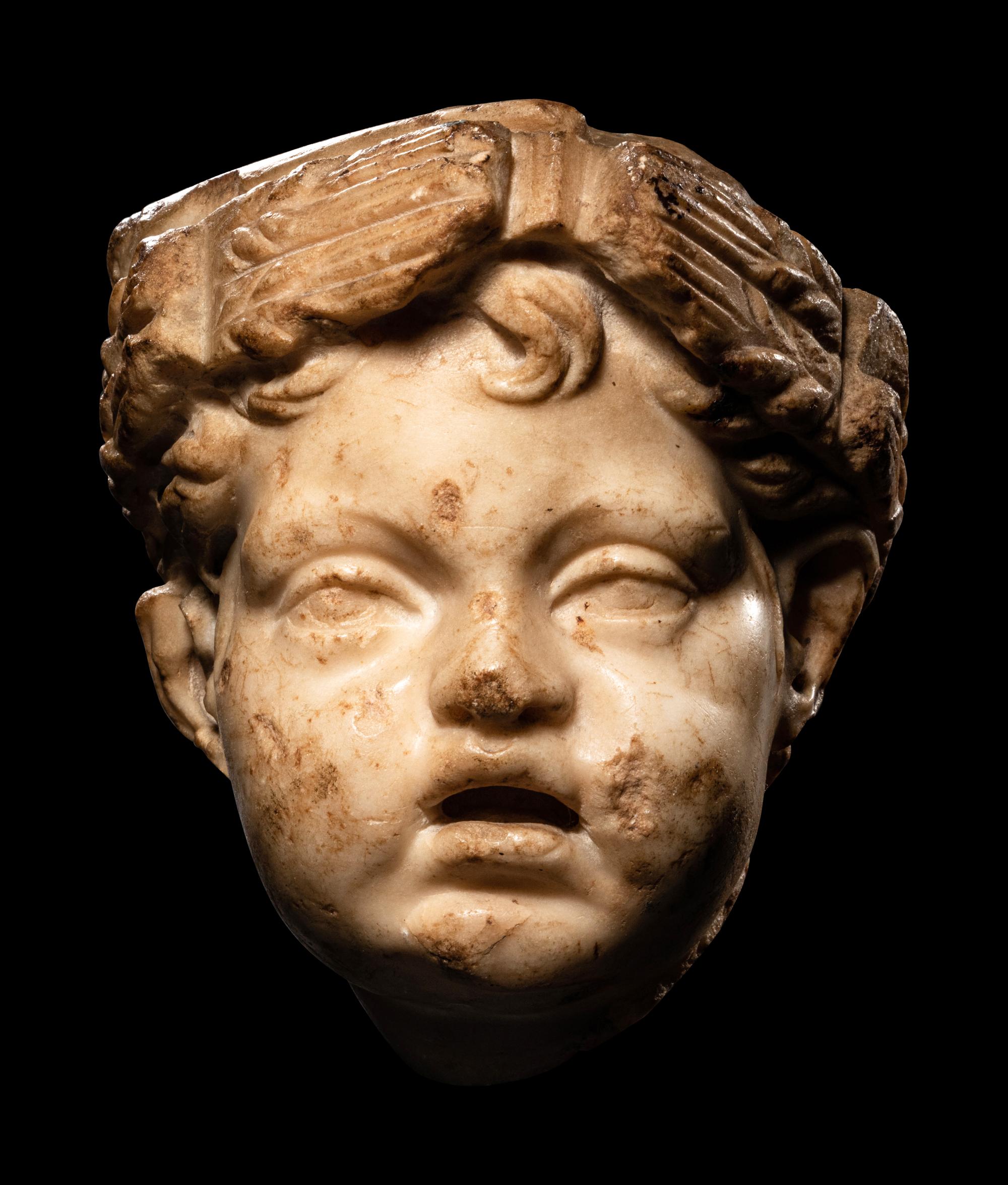 A Roman Marble Head of Eros
