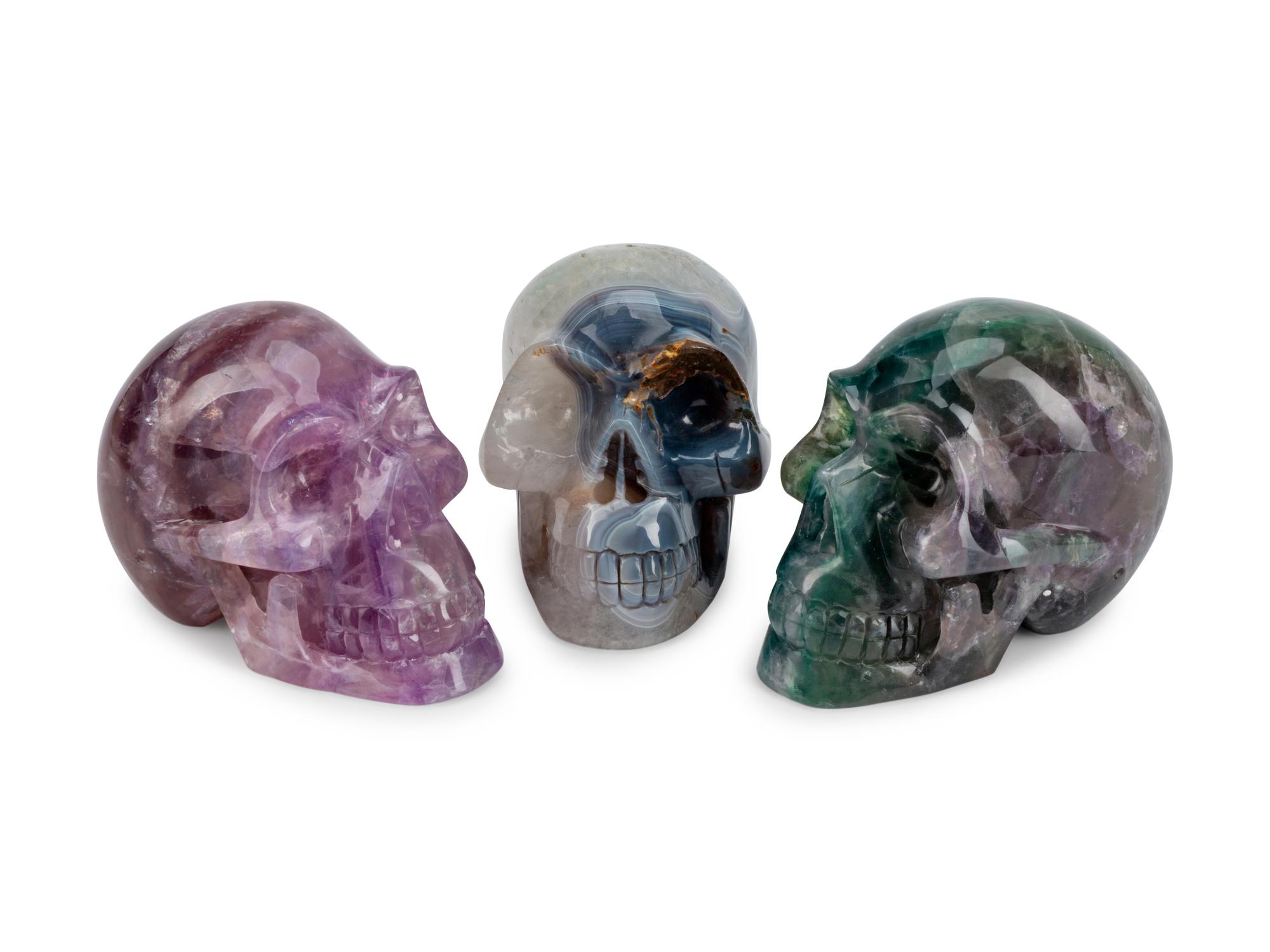 Three Carved Semi-Precious Stone Skulls