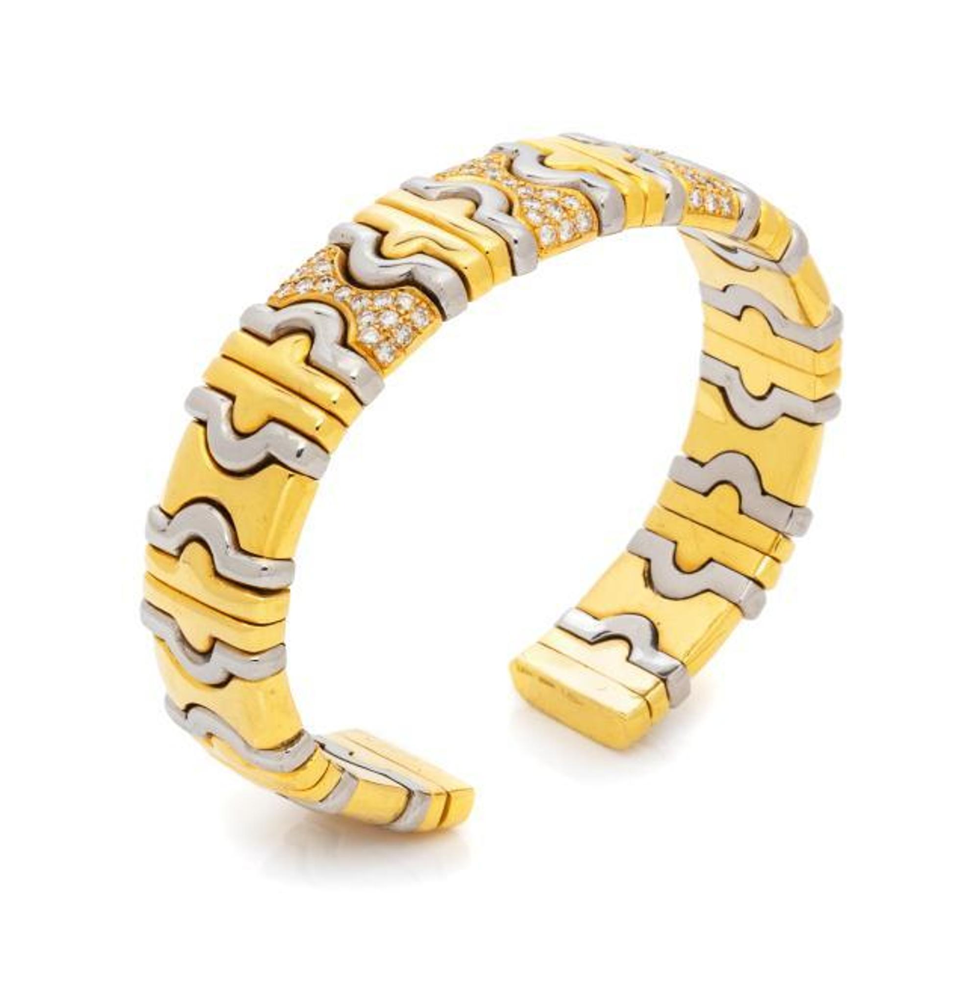 DINO CEVA, YELLOW GOLD, STEEL AND DIAMOND CUFF BRACELET