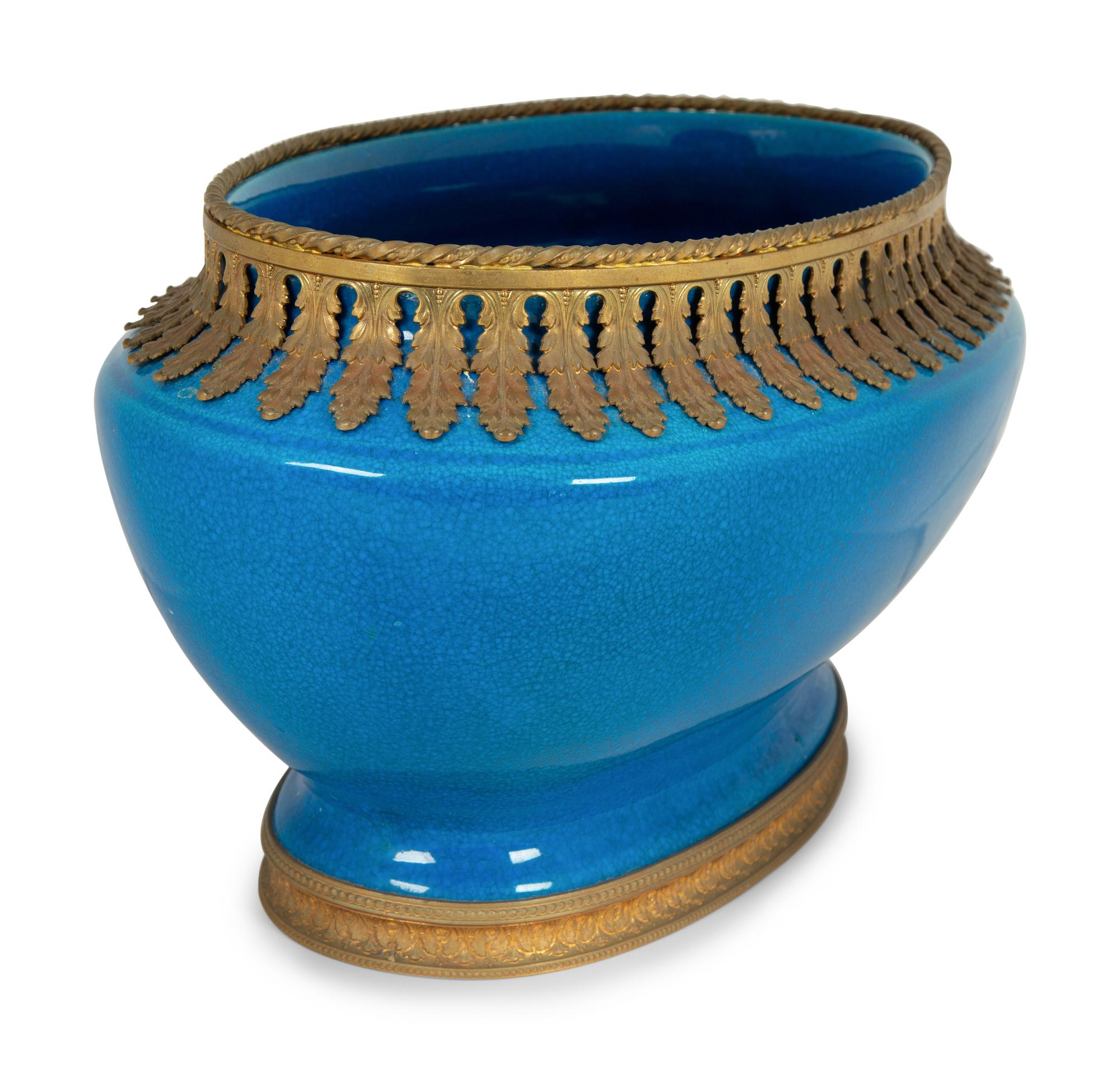 A Boch Frères Metal Mounted Porcelain Centerpiece Bowl