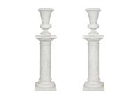 A Pair of White Marble Urns on Matching Pedestals