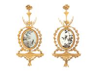 A Pair of George III Giltwood and Reverse-Painted Mirror Wall Appliques