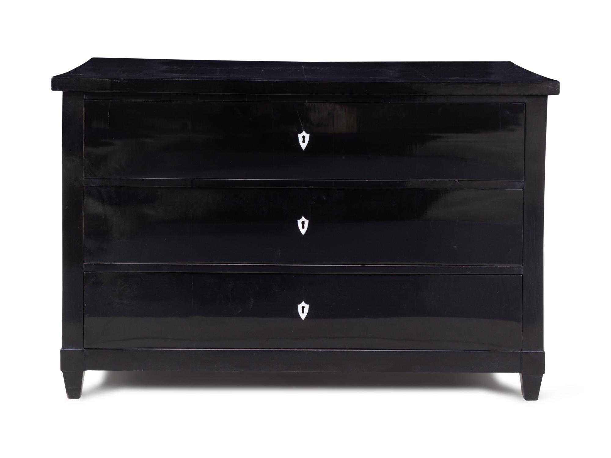 A Biedermeier Ebonized Chest of Drawers
