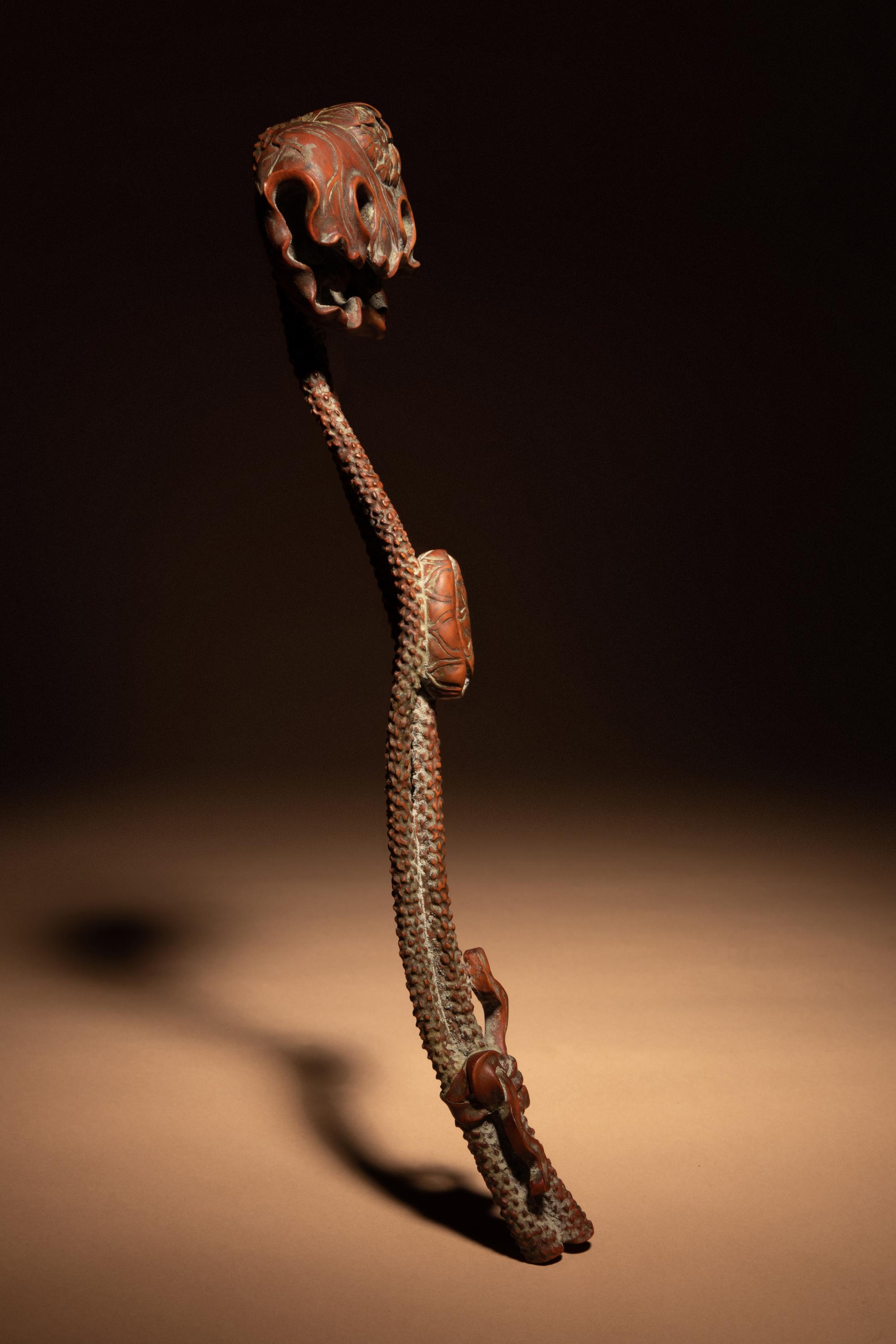 A Chinese Carved Boxwood 'Lotus and Frog' Ruyi Scepter