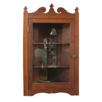 A Wall Mounted Corner Cabinet 26.25" W x 13" D x 43.25" H — United States, 19th Century