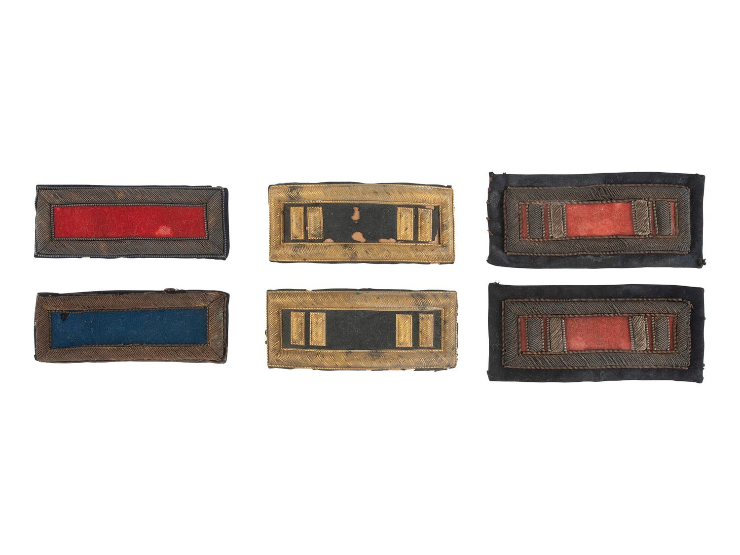 [MILITARIA]. A group of 6 Civil War-era shoulder straps for infantry and artillery officers.