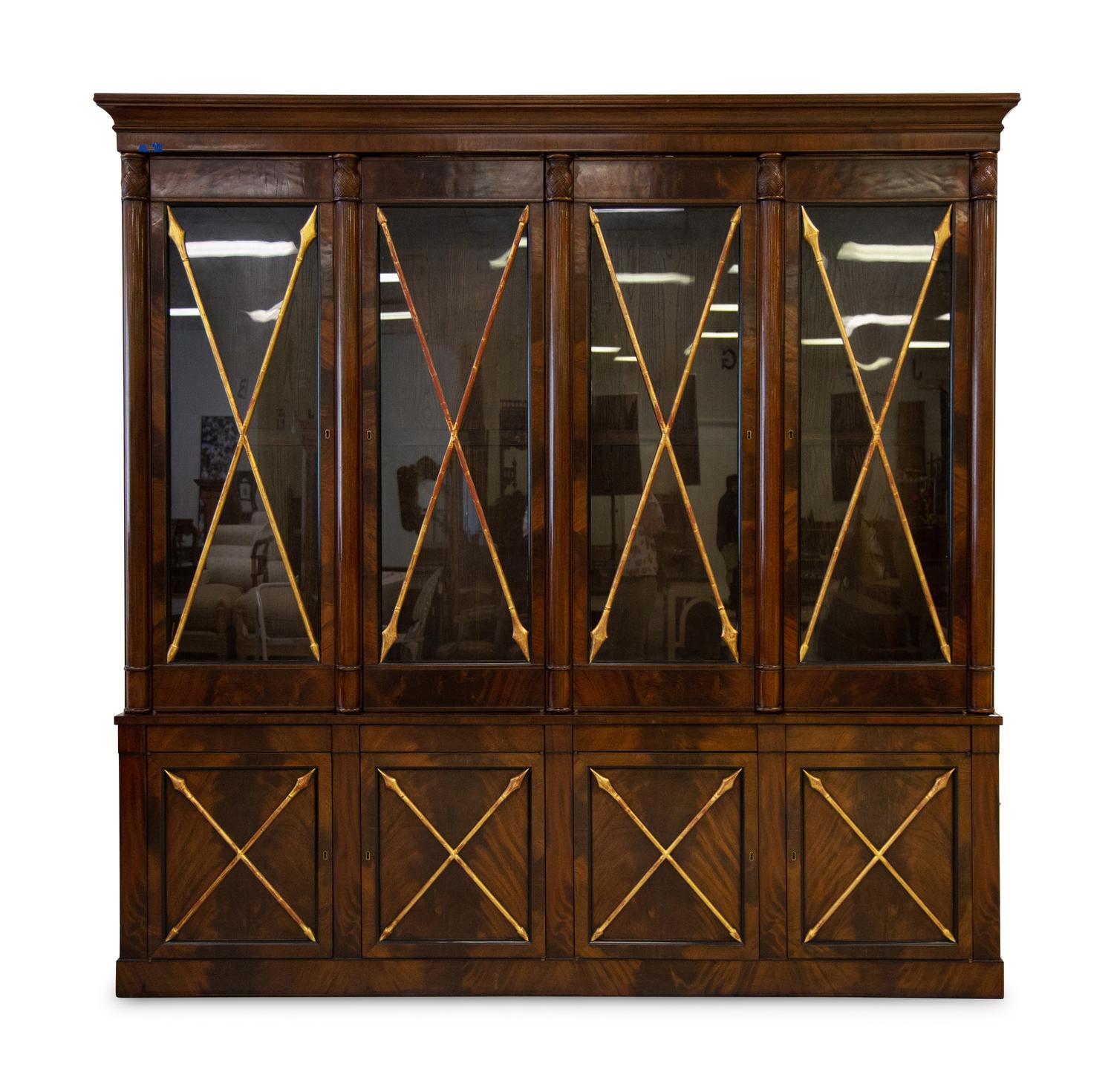 A Empire Style Mahogany and Parcel Gilt Bookcase