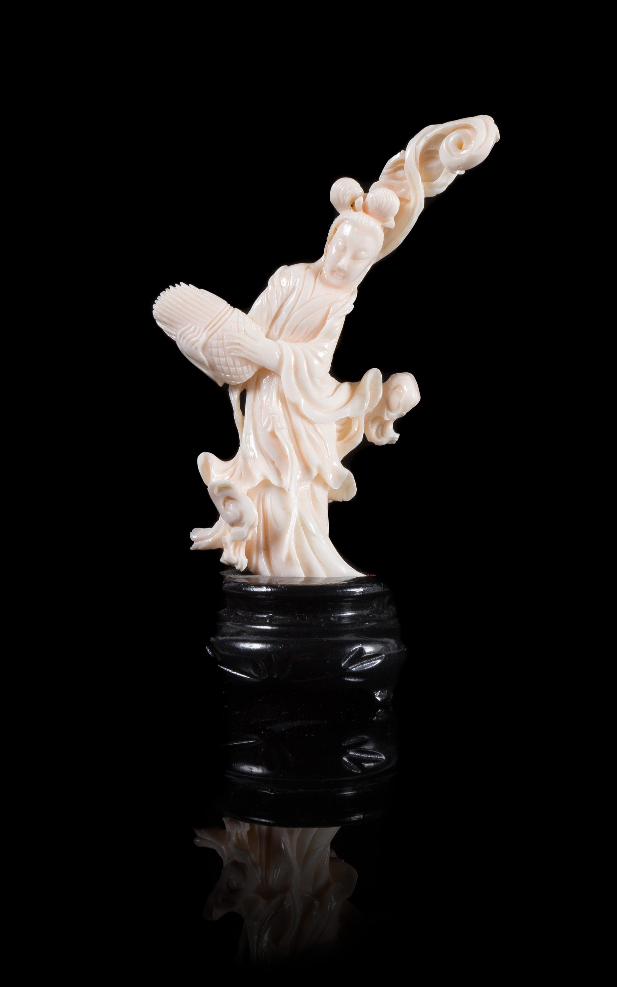 A Pink Coral Figure of a Female Immortal Height 5 1/4 inches. — LATE QING DYNASTY