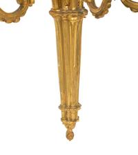 A Pair of Louis XVI Style Gilt Bronze Three-Light Wall Sconces