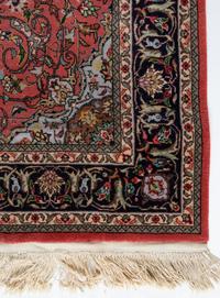 A Kashan Wool Rug