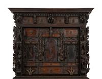 A Continental Baroque Walnut Cabinet