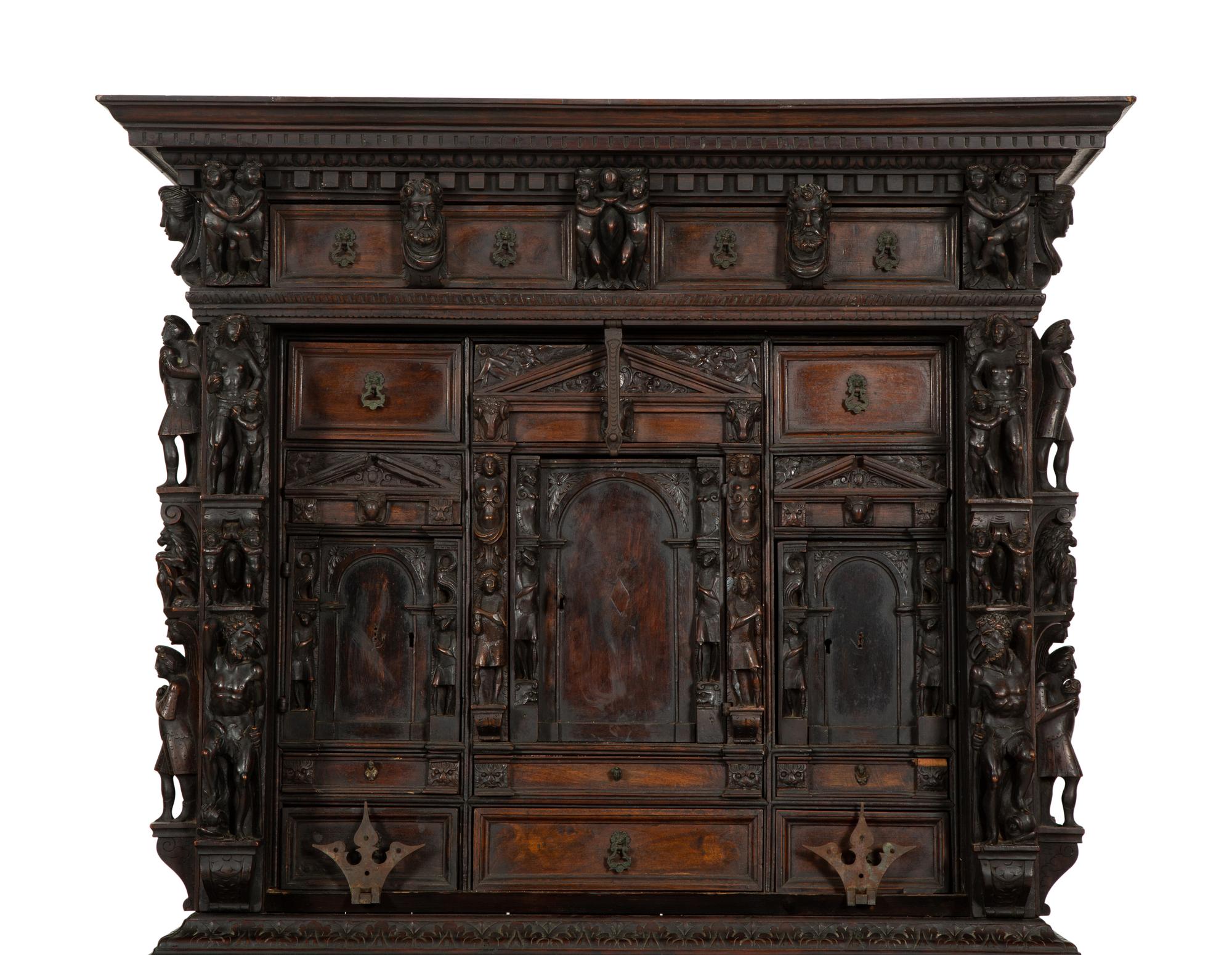 A Continental Baroque Walnut Cabinet