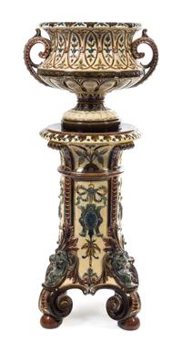 A Continental Majolica Urn and Pedestal Height overall 46 1/2 inches.