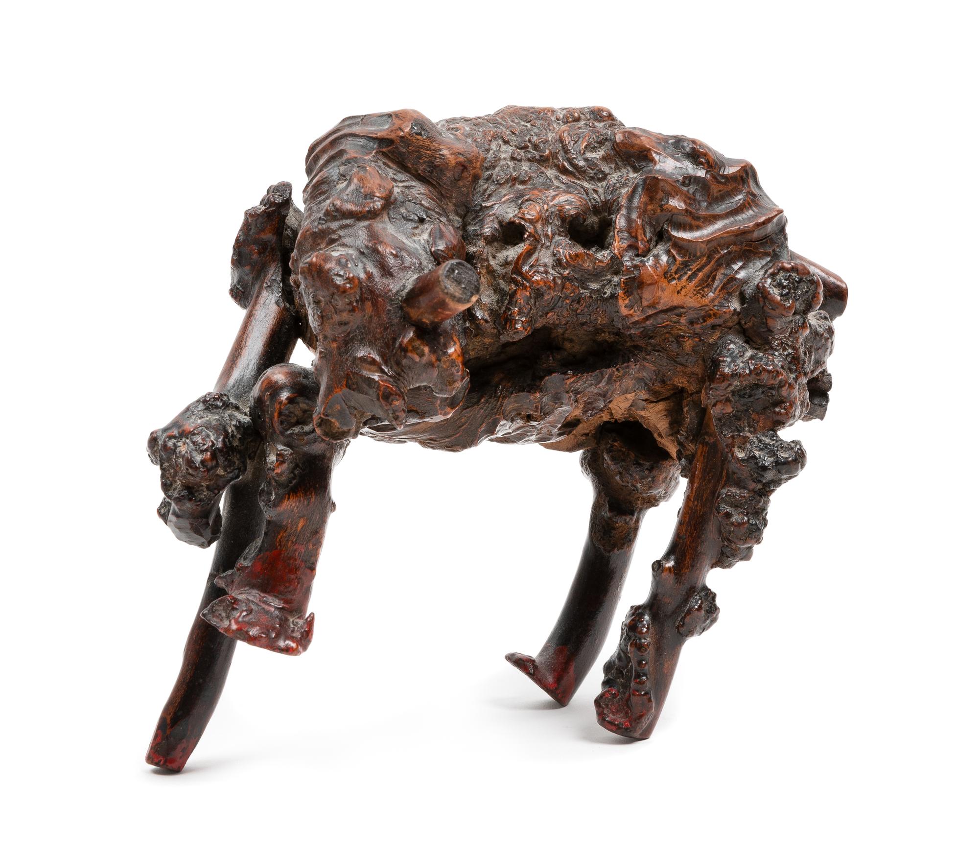 A Chinese Rootwood Figure of an Ox Length 7 1/4 inches. — 19TH CENTURY