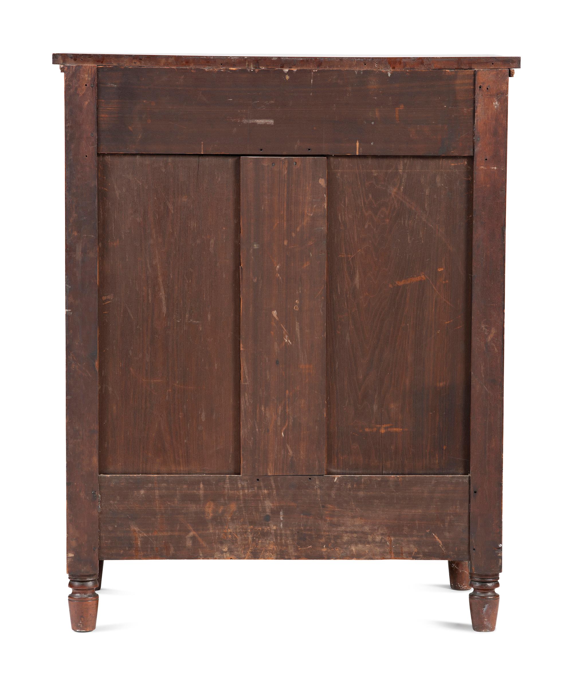 A Federal Carved and Inlaid Cherrywood Chest of Drawers