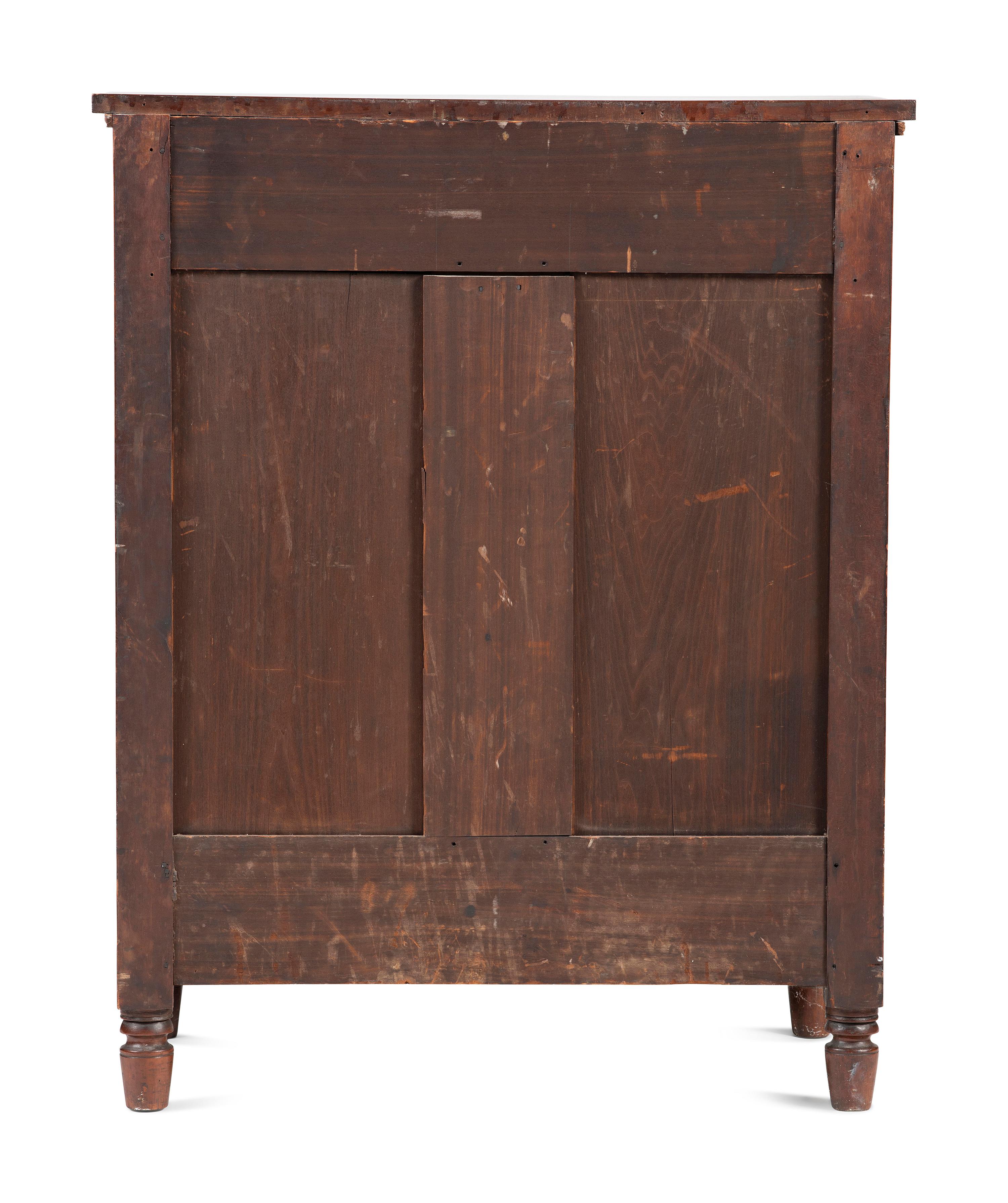 A Federal Carved and Inlaid Cherrywood Chest of Drawers