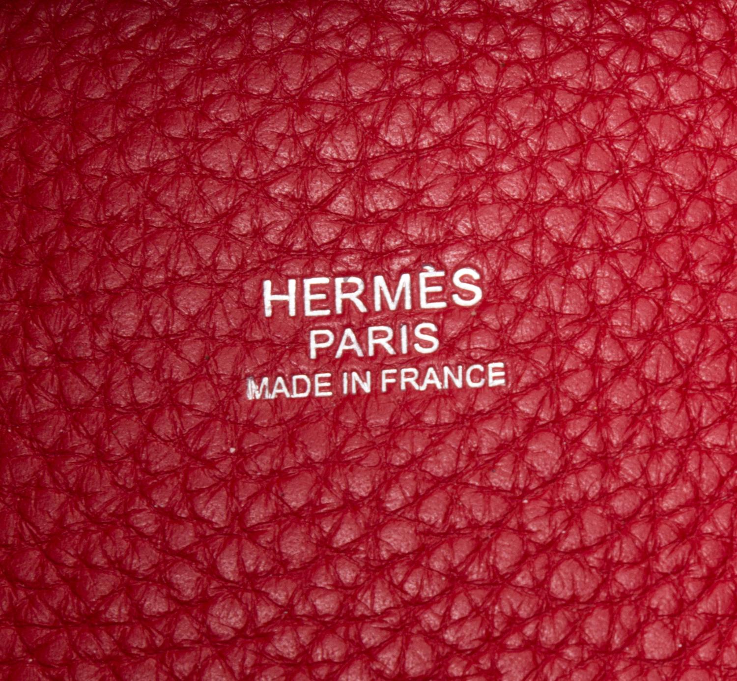 An Hermes Rouge Casaque Taurillon Clemence Picotin Lock TGM Handbag, 13" x 13" x 9".