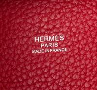 An Hermes Rouge Casaque Taurillon Clemence Picotin Lock TGM Handbag, 13" x 13" x 9".