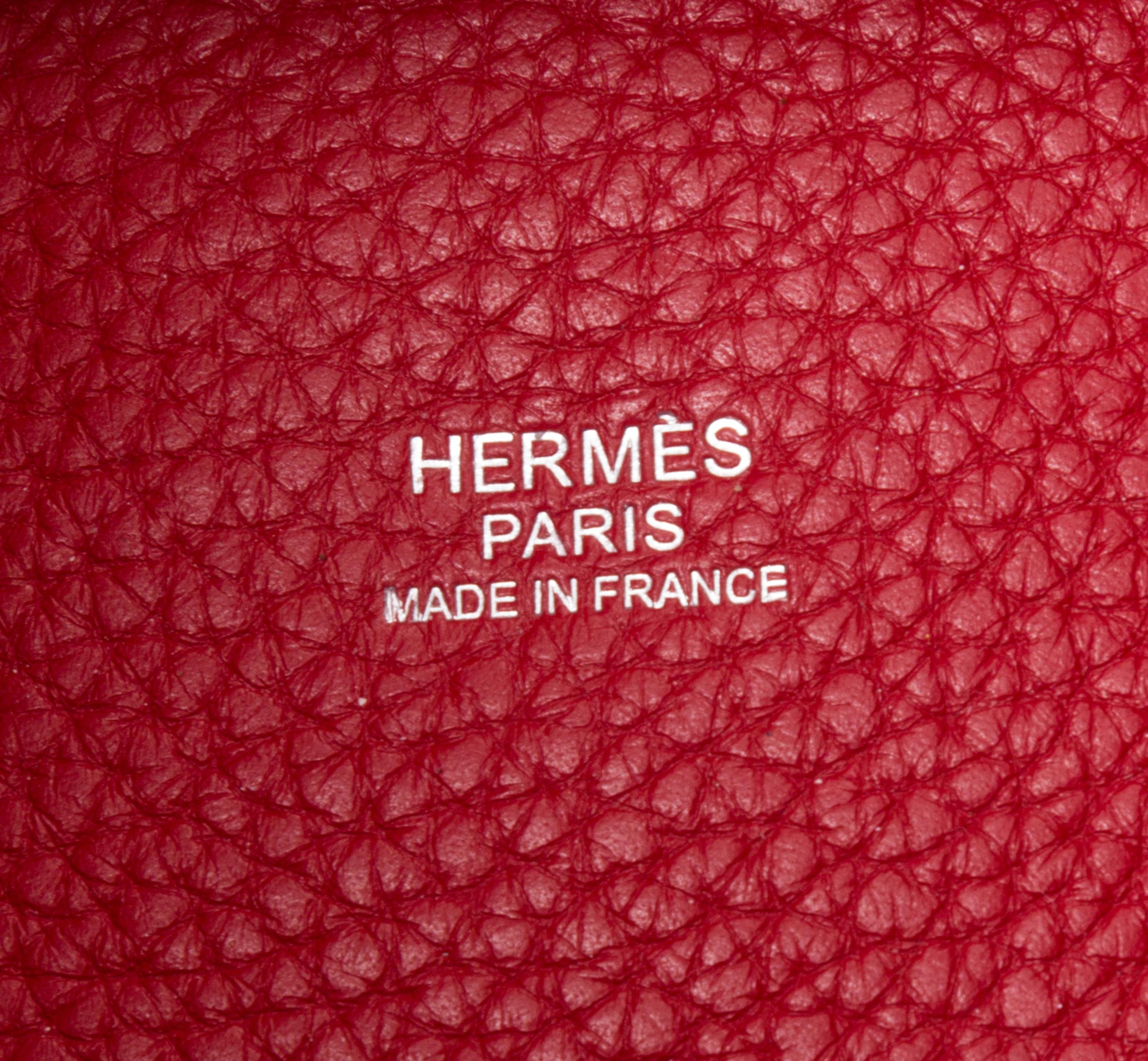 An Hermes Rouge Casaque Taurillon Clemence Picotin Lock TGM Handbag, 13" x 13" x 9".