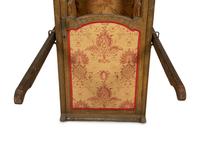 A Venetian Carved and Painted Giltwood Sedan Chair