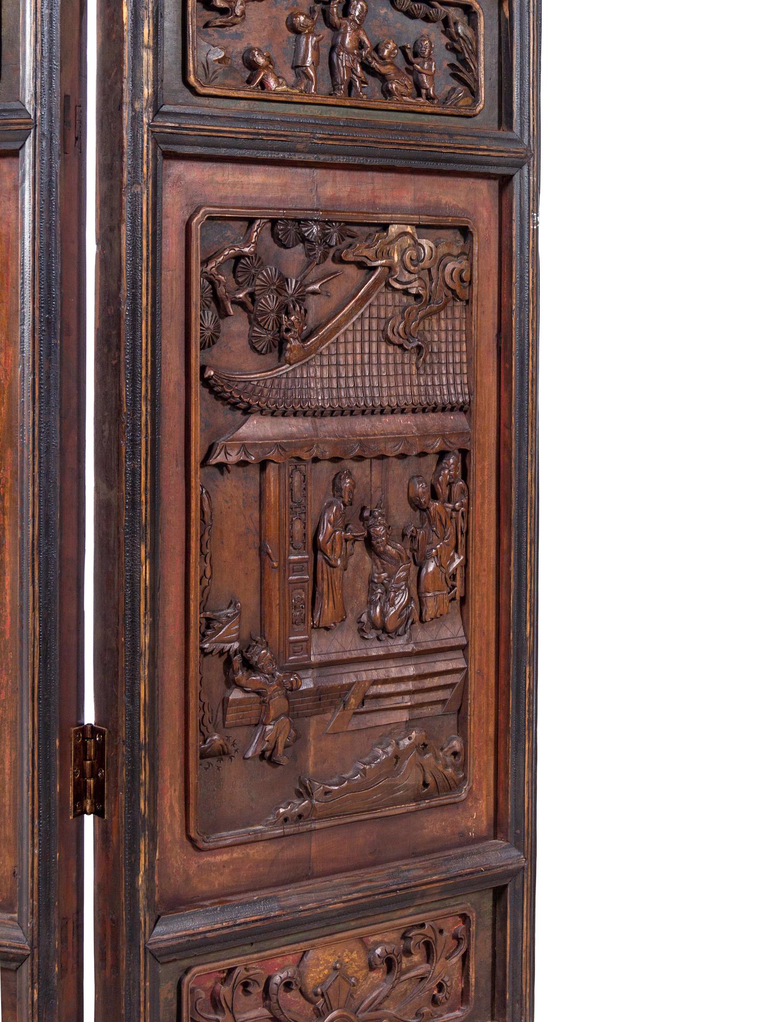 A Chinese Carved Hardwood Four-Panel Floor Screen