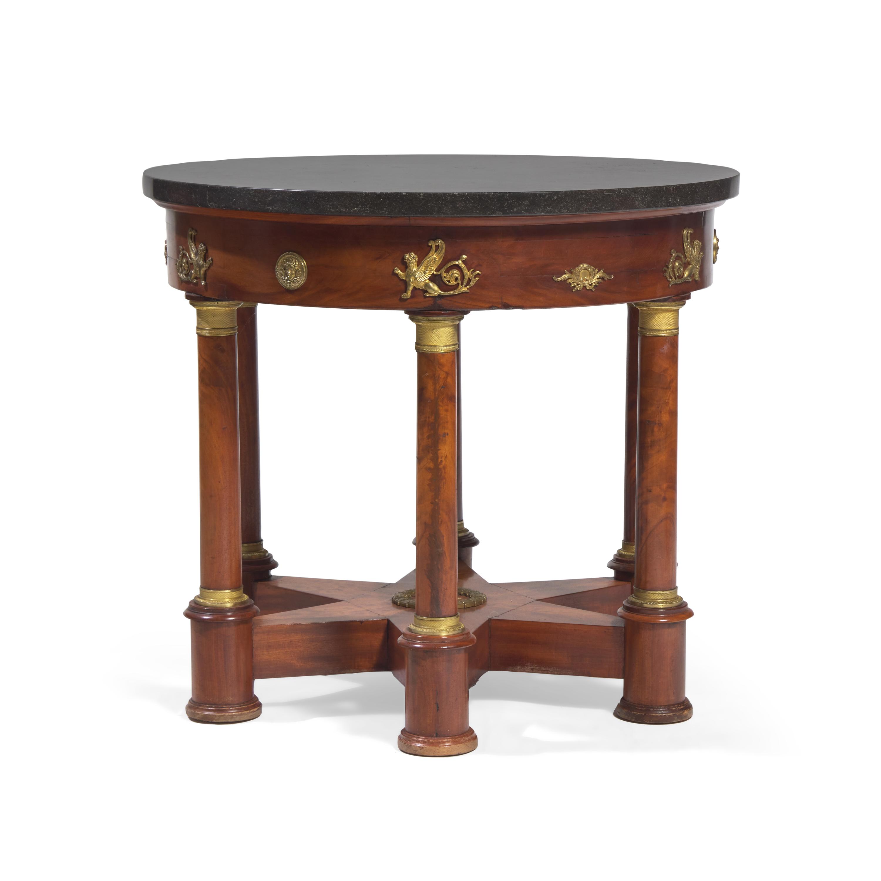 An Empire Flame Mahogany, Gilt-Metal Mounted and Marble-Top Center Table