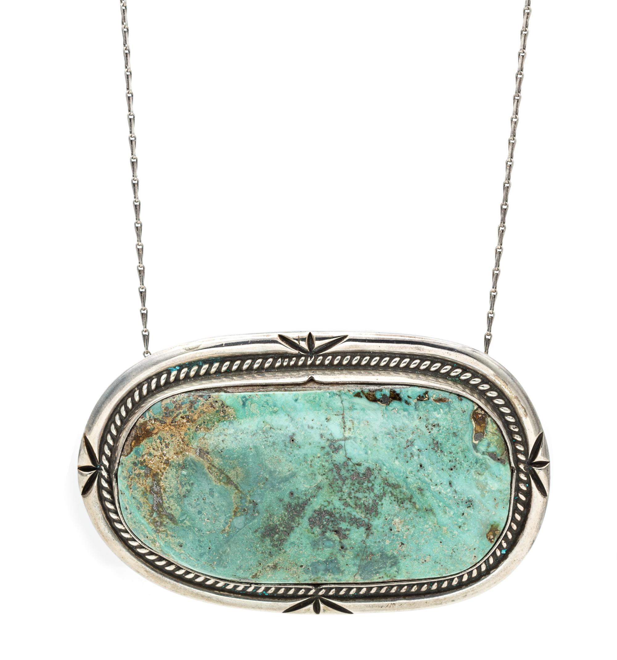 A Silver and Turquoise Pendant, 59.30 dwts.