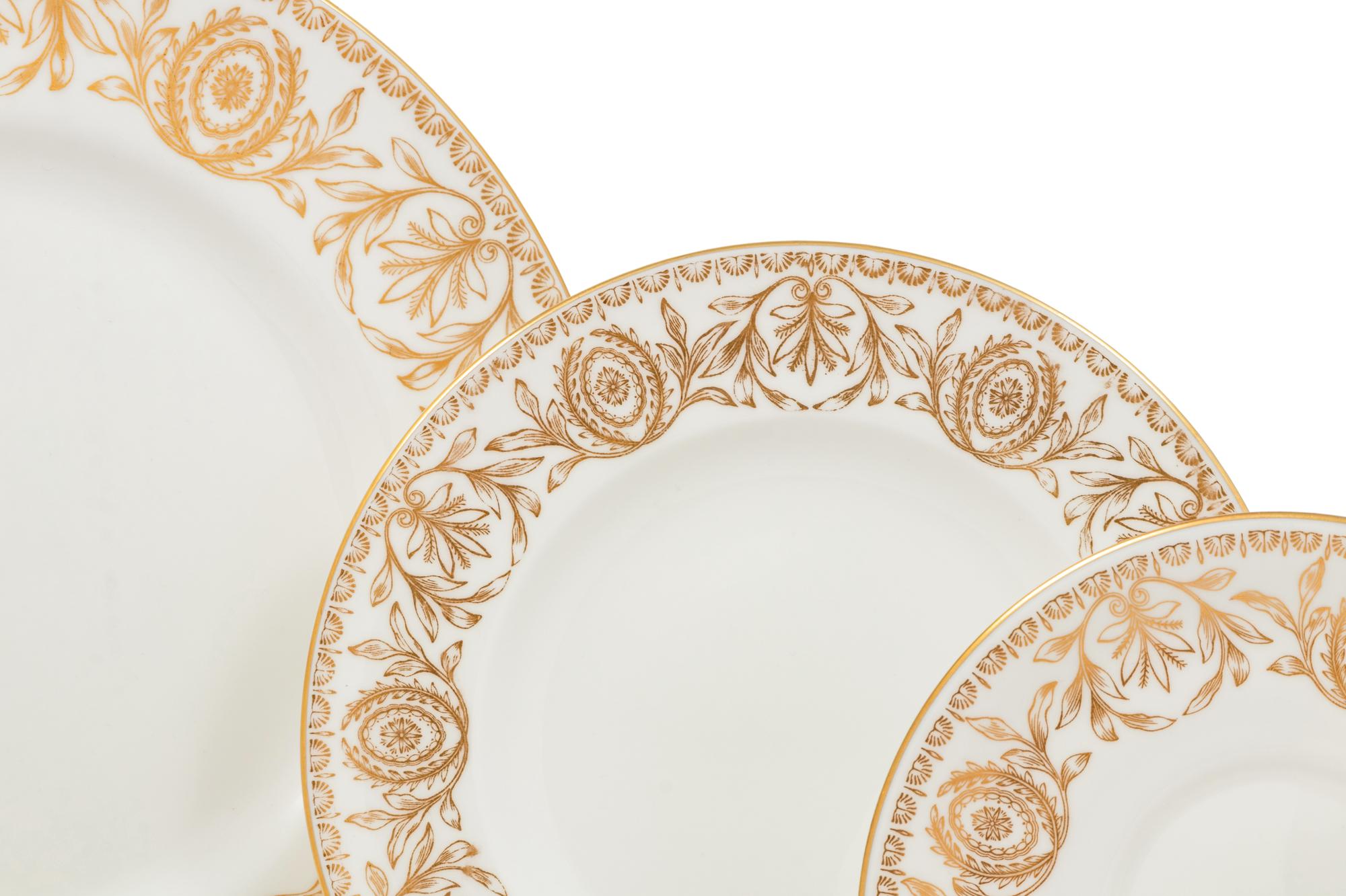 A Royal Worcester Pompadour Porcelain Dinner Service