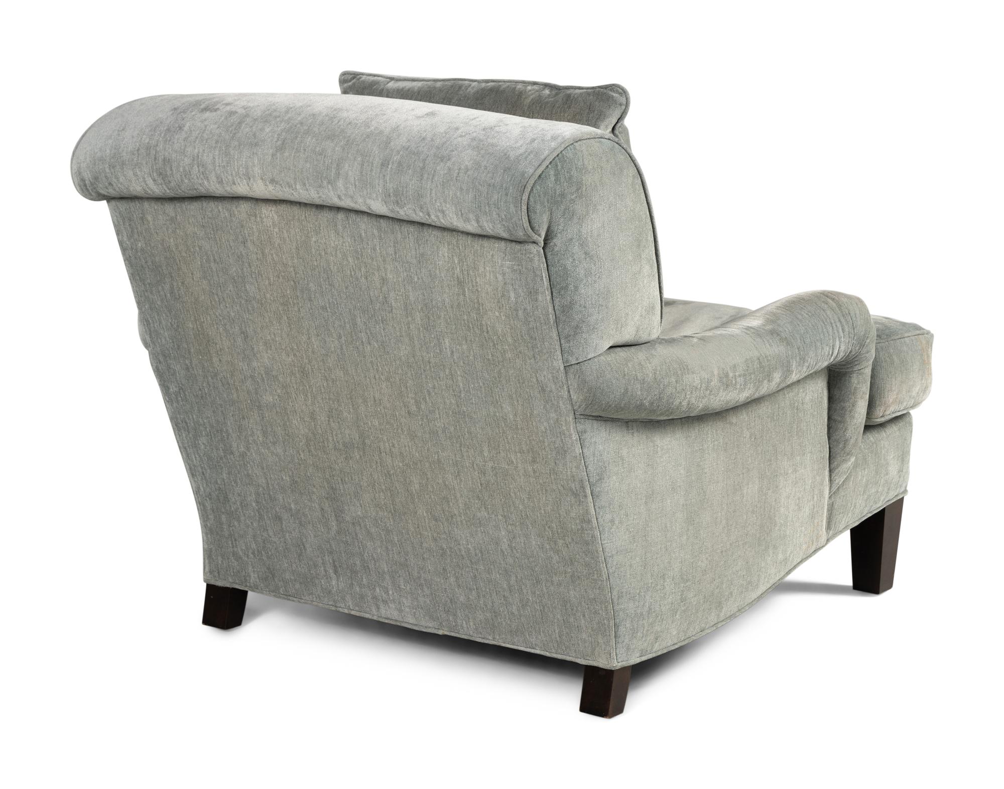 A Lounge Chair together with an Ottoman