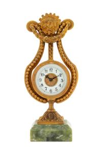 A French Gilt Metal and Hardstone Clock