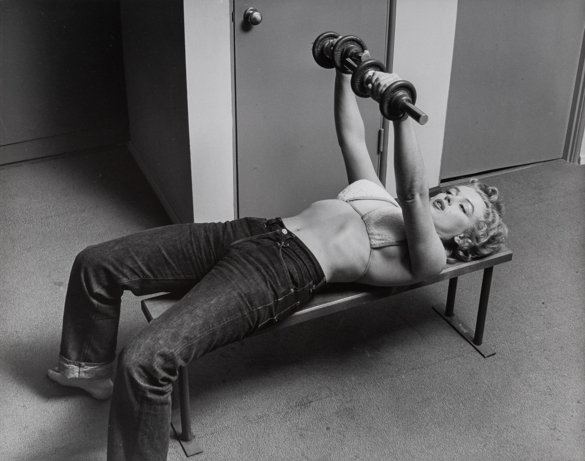 Philippe Halsman (1906-1979) Marilyn Monroe Lifting Weights, 1952