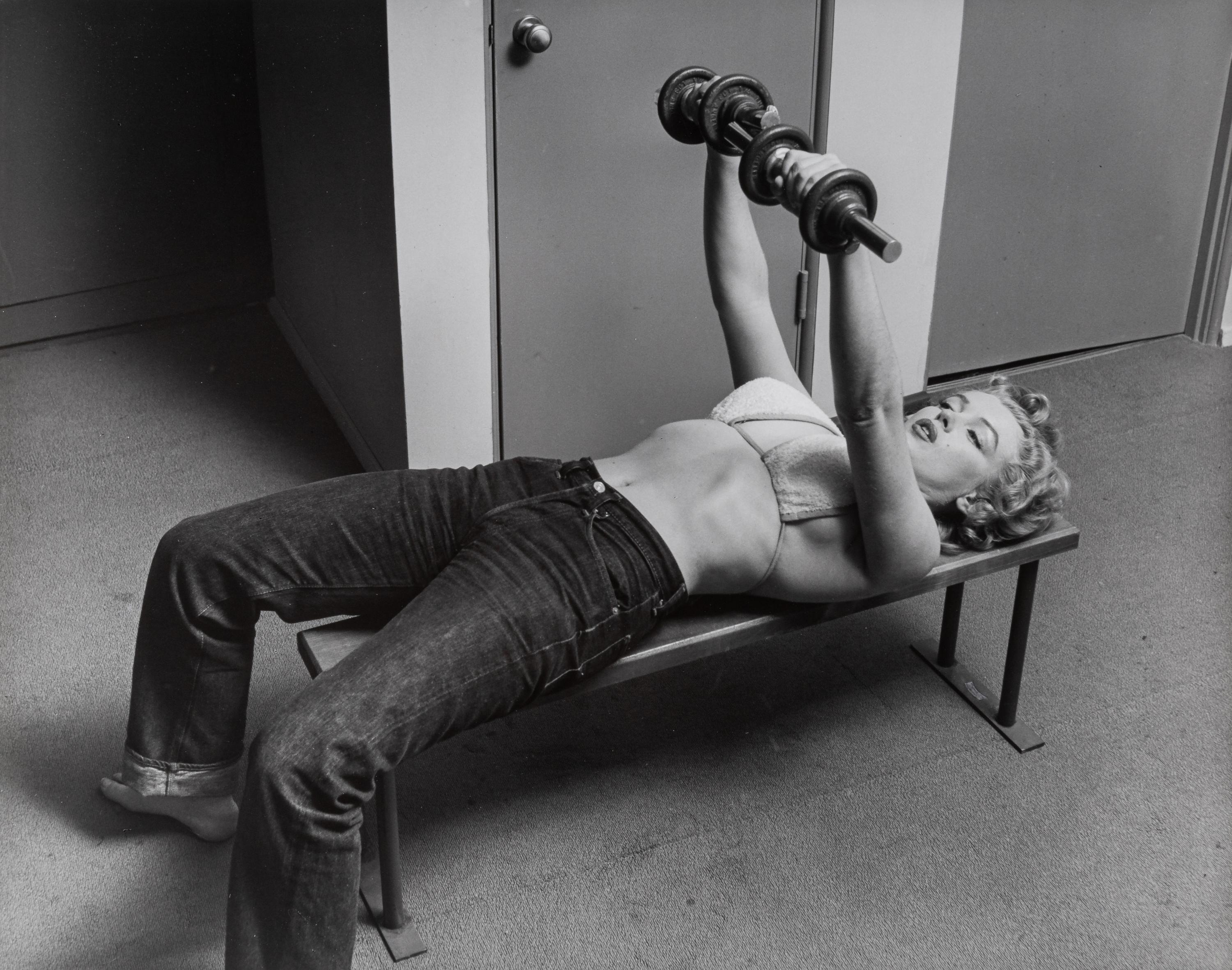 Philippe Halsman (1906-1979) Marilyn Monroe Lifting Weights, 1952