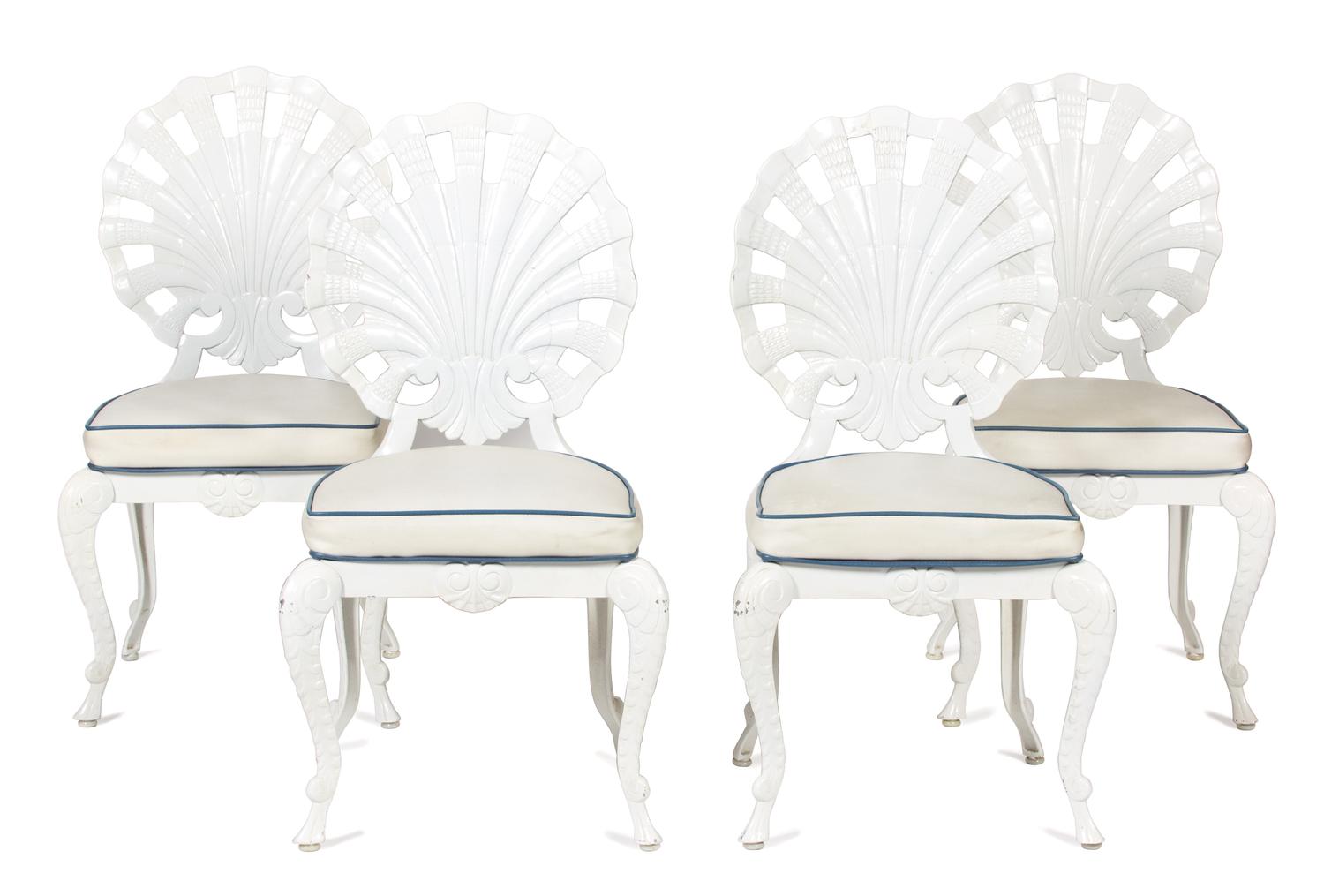 A White Painted Metal Glass Top Table and Four Shell-Form Back Chairs Height of chairs 37 inches. Table height 28 x width 52 x depth 34 — 20TH CENTURY