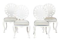 A White Painted Metal Glass Top Table and Four Shell-Form Back Chairs Height of chairs 37 inches. Table height 28 x width 52 x depth 34 — 20TH CENTURY