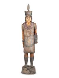 A Carved and Painted Wood Tobacco Trade Figure of a Native American