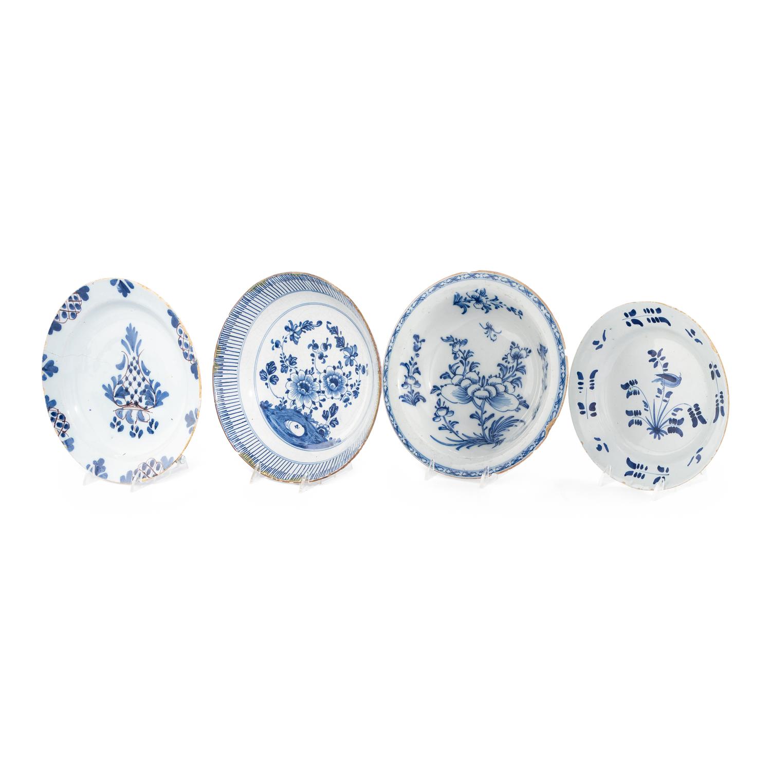 A Collection of Four Delft Blue and White Decorated Articles